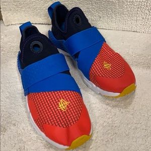 Nike huarache slide on.  Tri color.  Size 7youth